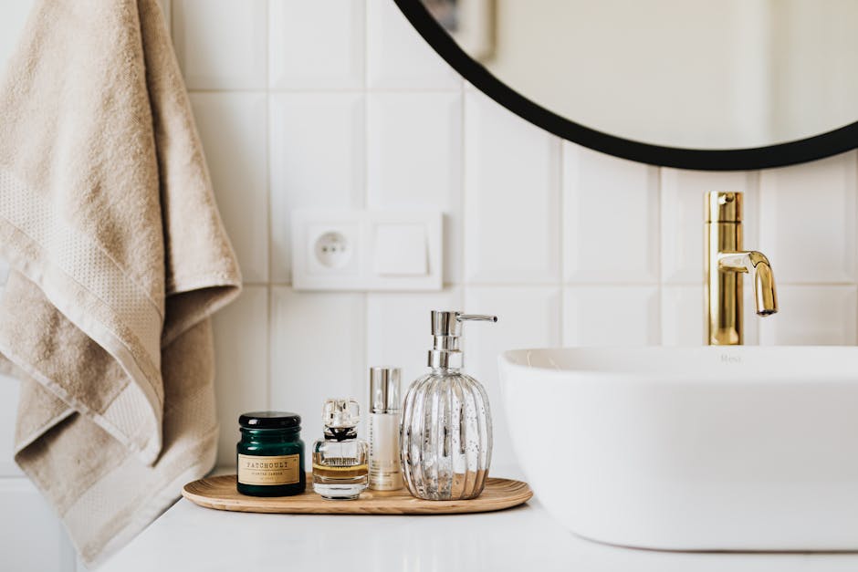 A stylish bathroom sink with skincare products and accessories for modern living
